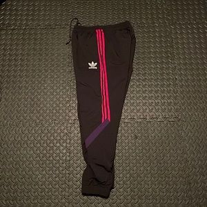 Adidas nylon track pants.